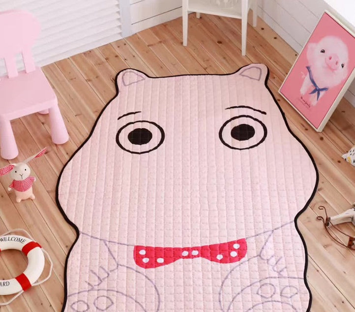 Kids room setup showing large animal play mat