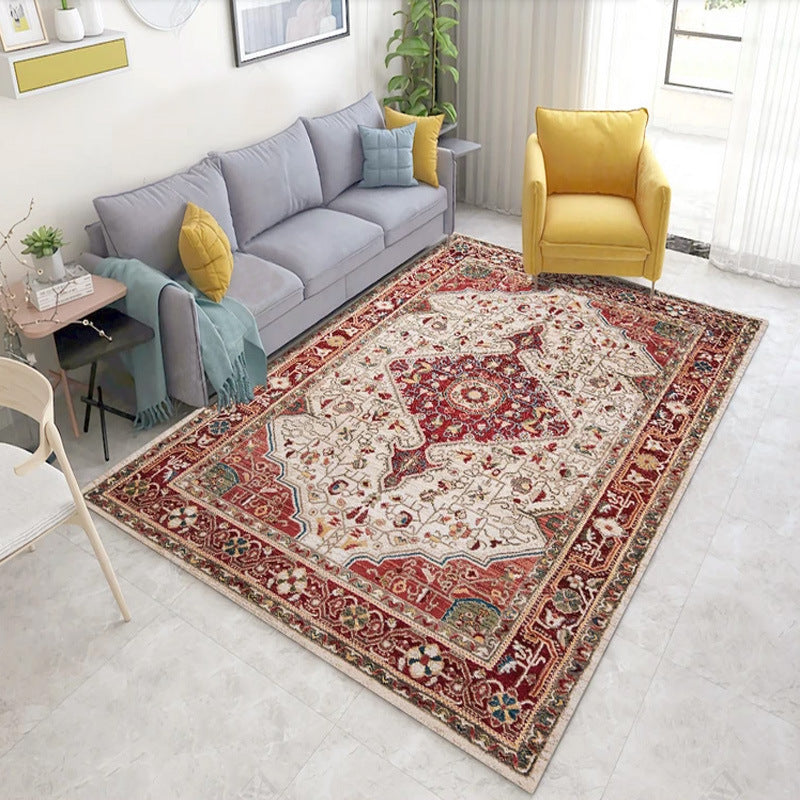 Nordic boho printed rug placed in bright living room with sofa and plants